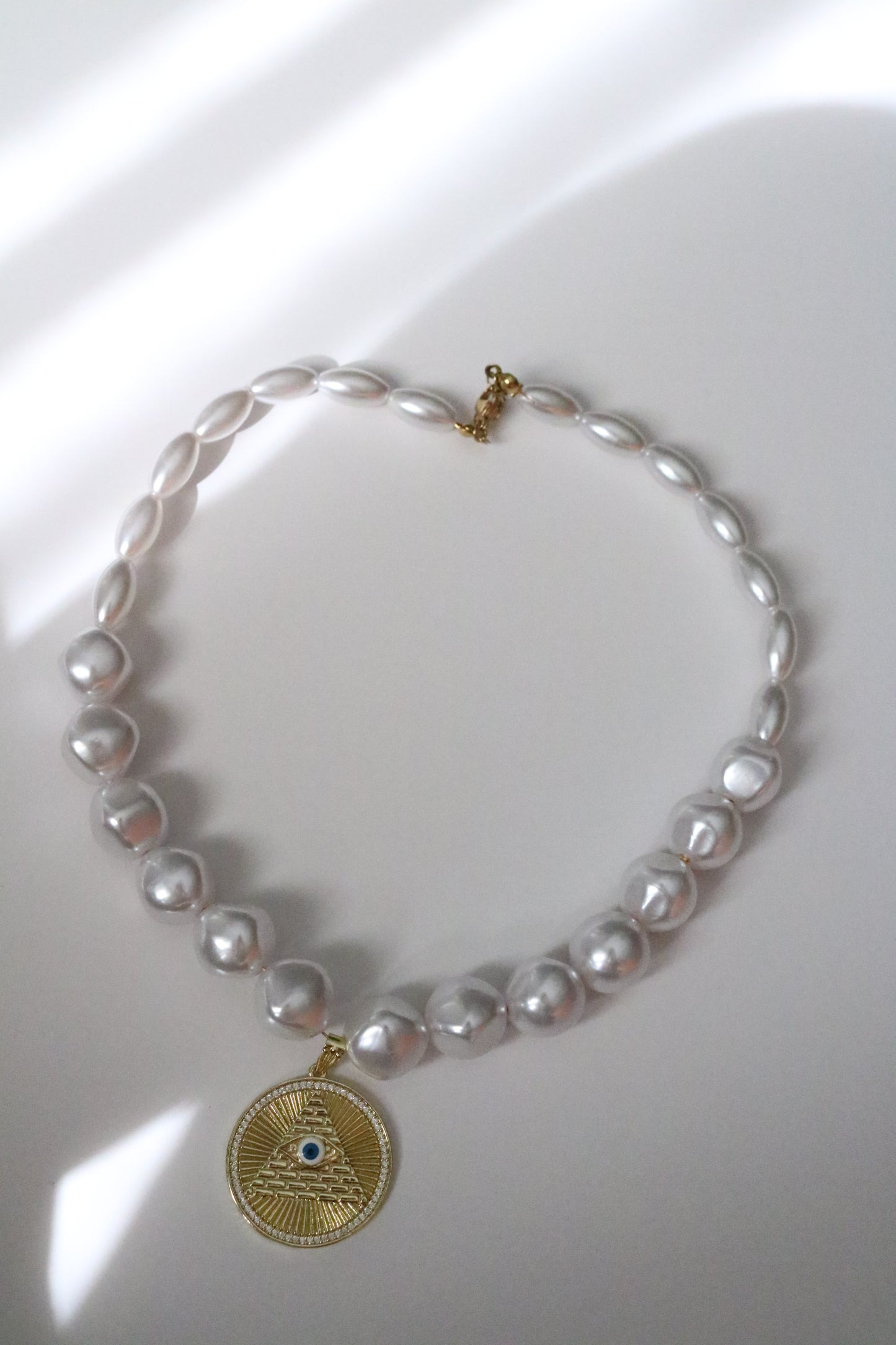 EVIL EYE PEARL CHOKER