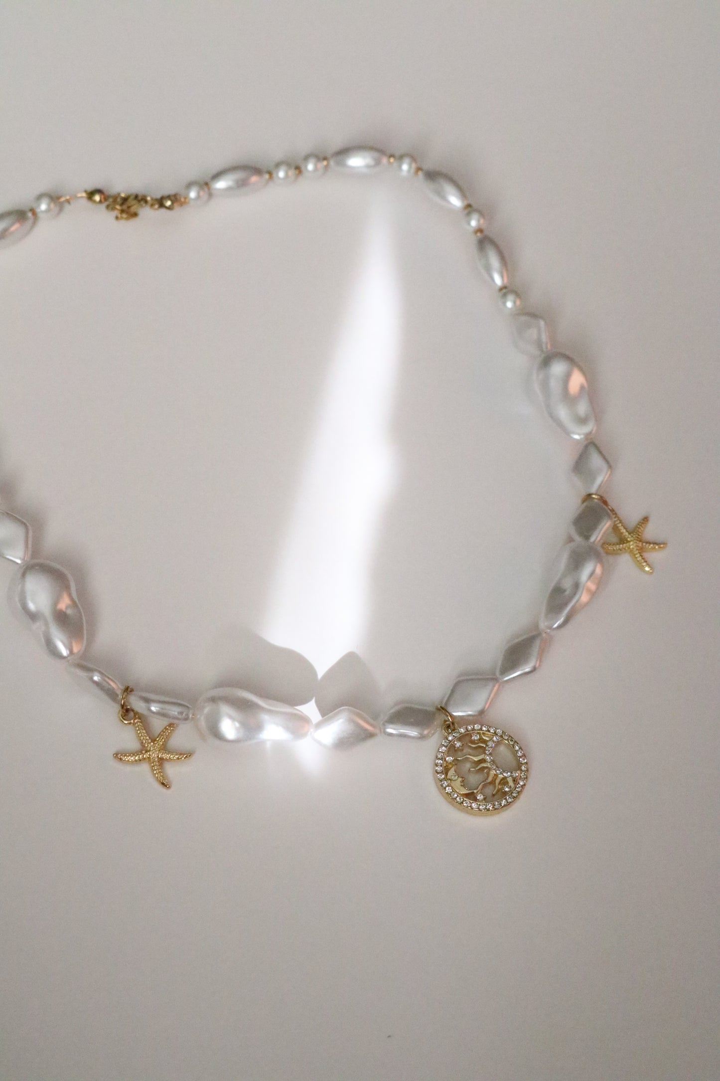 HALF SUN PEARL CHOKER