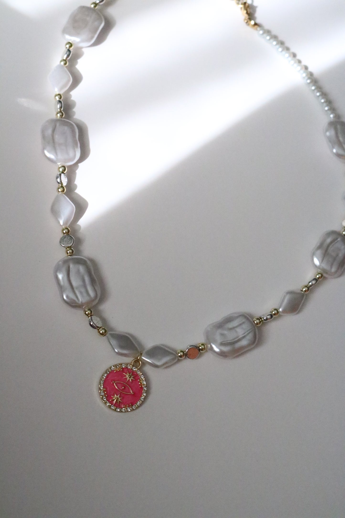 PINK EVIL EYE PEARL CHOKER