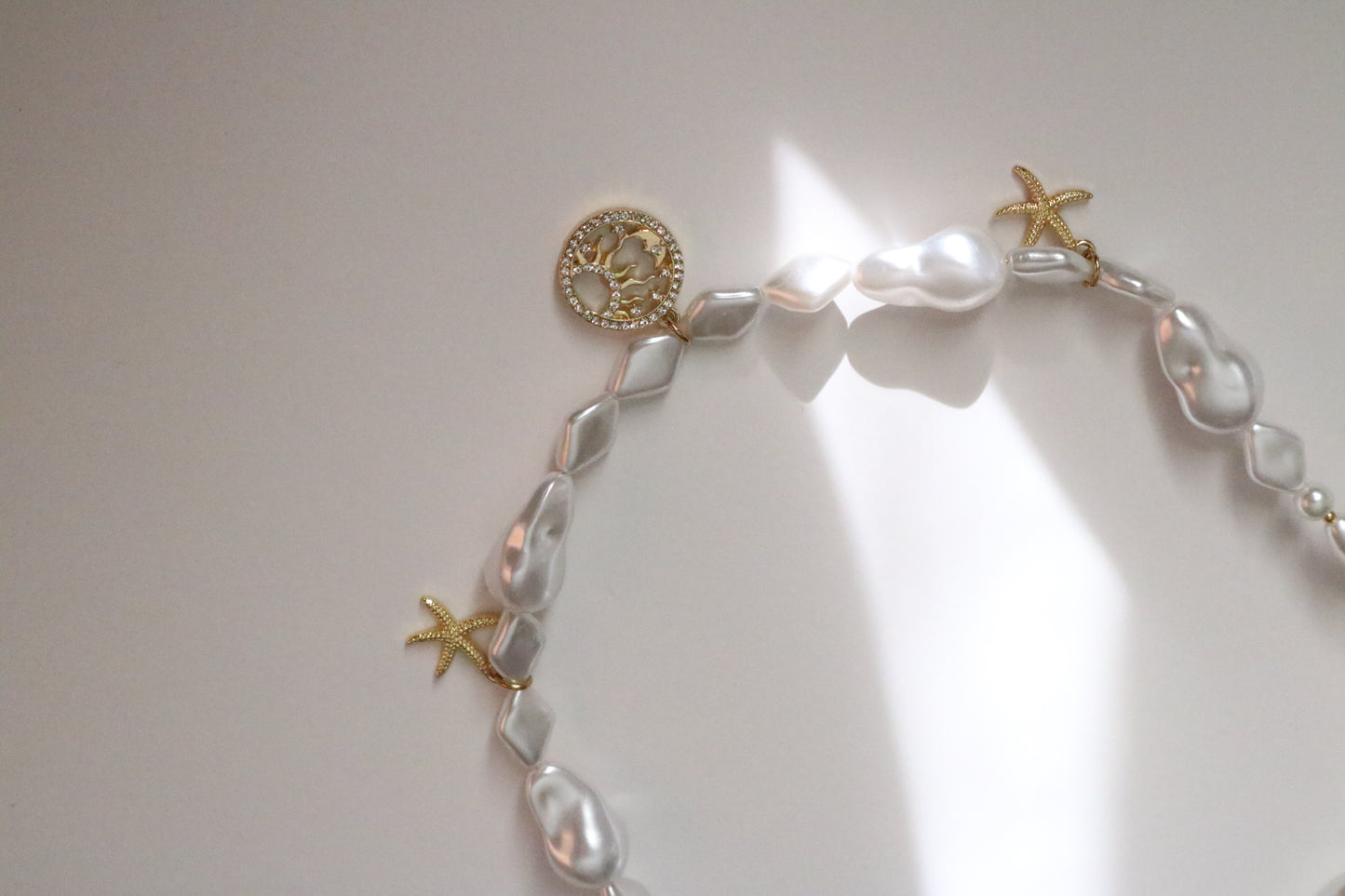 HALF SUN PEARL CHOKER