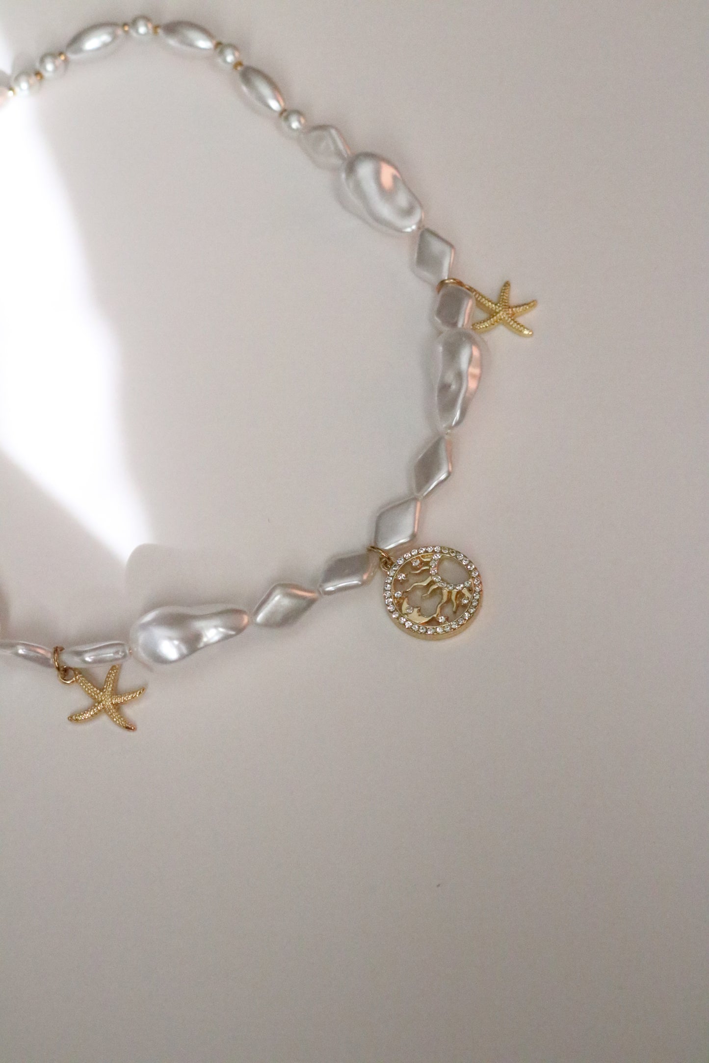 HALF SUN PEARL CHOKER