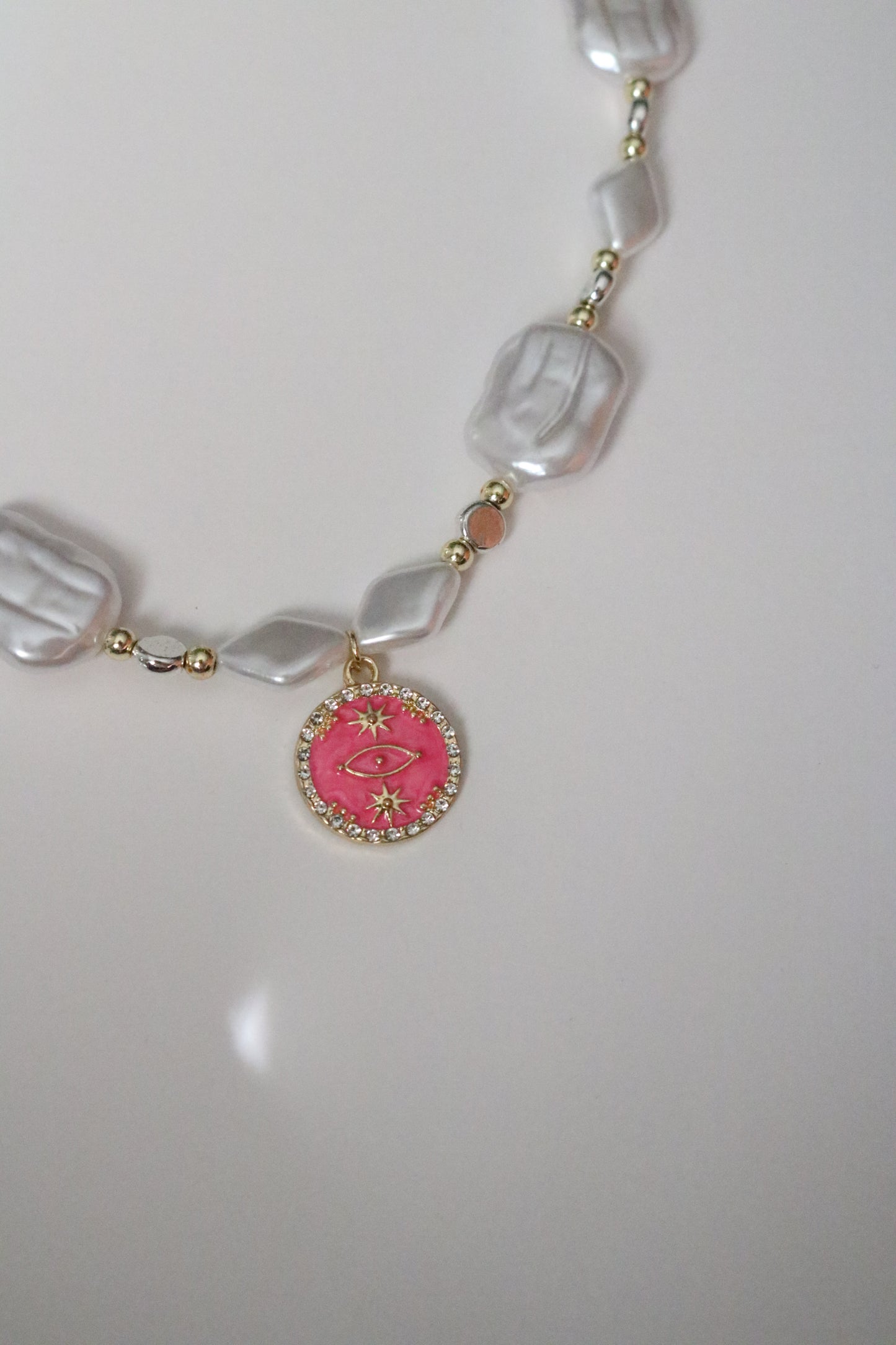 PINK EVIL EYE PEARL CHOKER